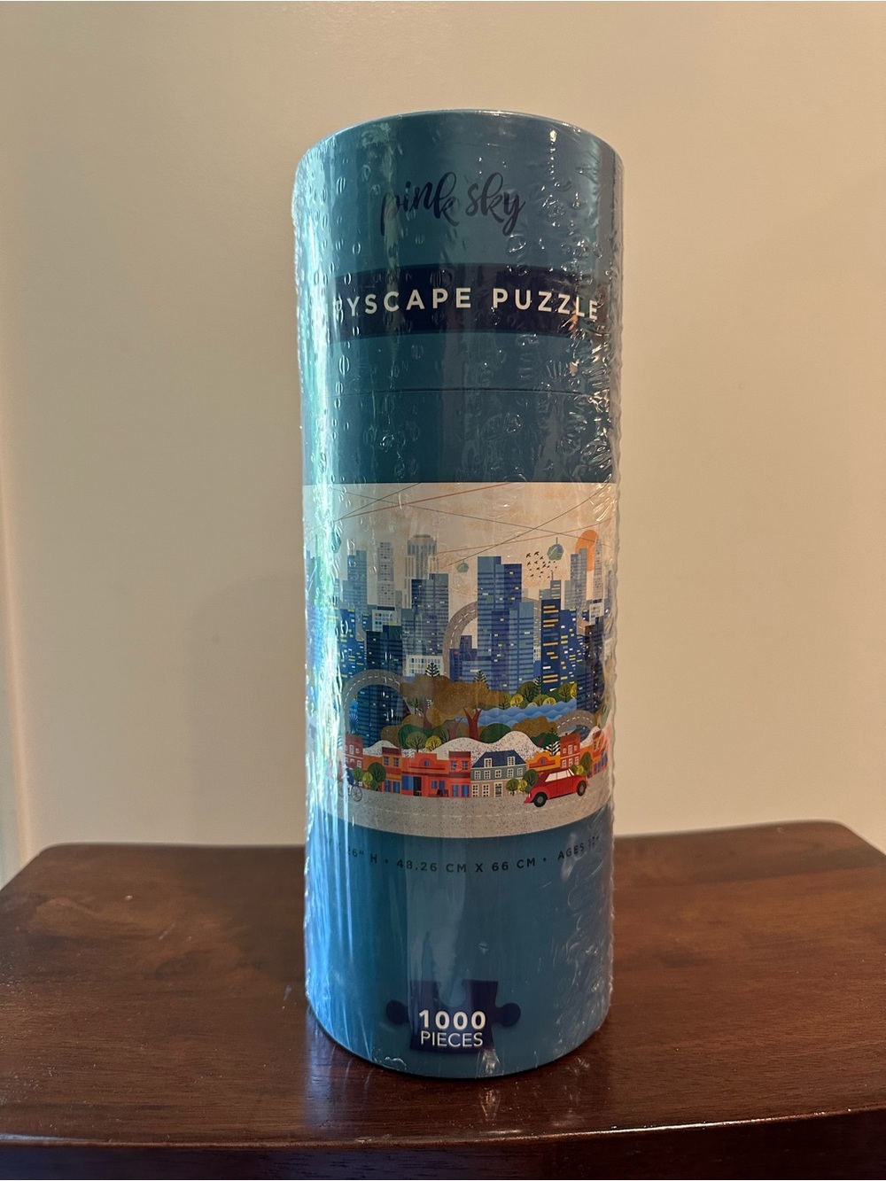 Pink Sky • 1,000 piece puzzle •’contained in a large canister • citiscape